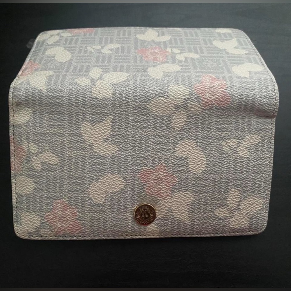 Grey wallet with white and pink flowers from Anne Klein